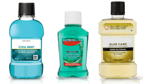 three different mouthrinse bottles