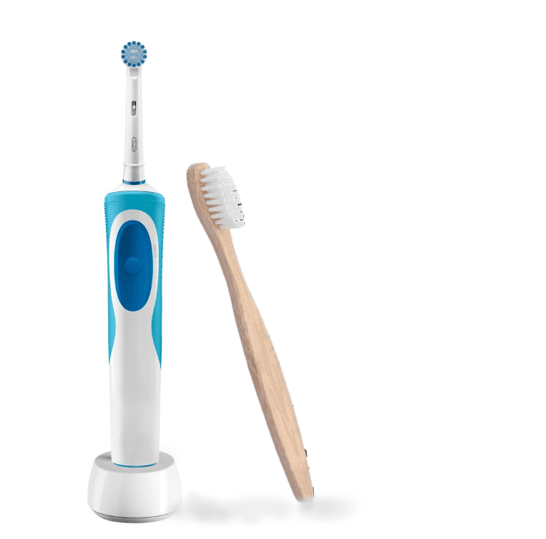 electric toothbrush next to a bamboo toothbrush